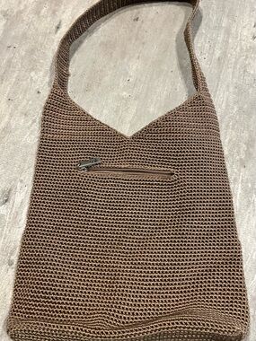 The SAK crochet natural tan sand hobo handmade shoulder style handbag
